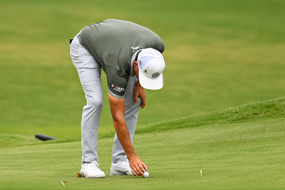 Rule 1.2 golf xác định bốn trụ cột ứng xử, từ trung thực đến bảo vệ sân, tạo nên nền tảng etiquette golf chuyên nghiệp. (Nguồn ảnh: Trang tin Golf Digest)
